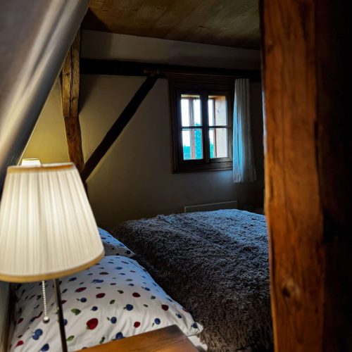 Pokoj ke kostelu v Pohádkové roubence